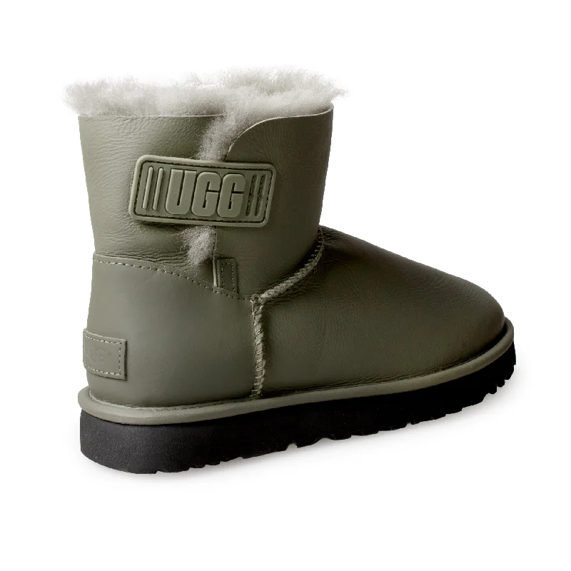 UGG Mini Bailey Logo Strap Ultra Matte Seaweed Boots - Women's